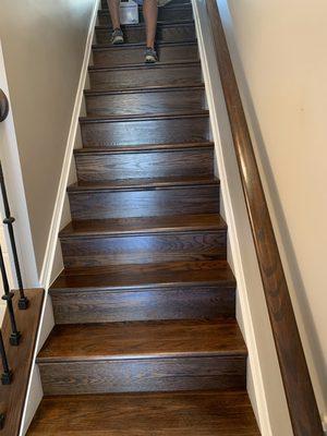 Custom made solid hardwood stairs finished on site.