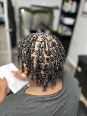 New two-strand retwist style for a fresh look. #LocStyle #TwoStrandTwist #NaturalHairJourney #StylishLocs"