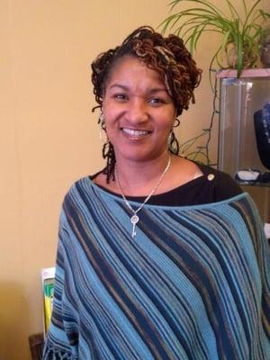 Stylist Jackie, who's passionate about natural hair. She trained directly under Sisterlocks creator Dr. Cornwell in the patented technique.