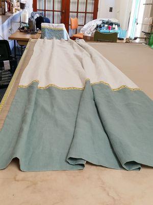 Two tone drape with trim over the seam