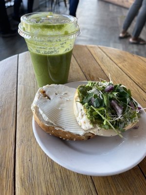 Avocado micro greens bagel with a green smoothie