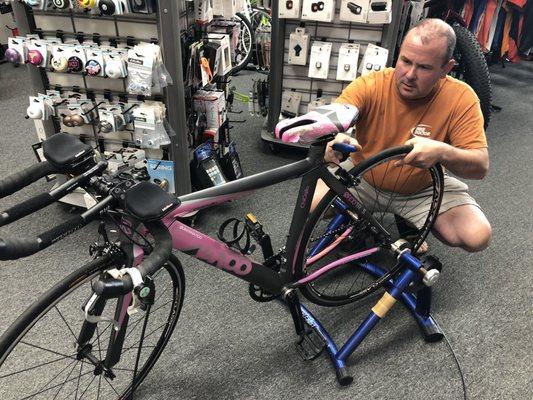 Showing me how to mount my bike on an indoor trainer. So awesome!