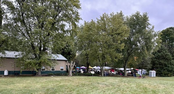 Side view of vendors and food trucks at the Dogtober Fest