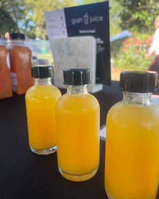 Ginger shots in 2oz glass bottles at the Islands Farmers Market