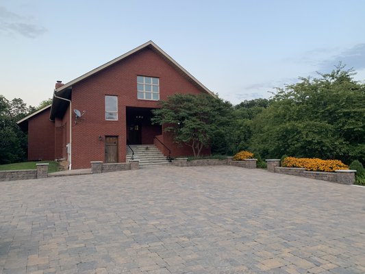 Main entrance - work continues up into the porch.  Note the Black Eyed Susans in landscaping