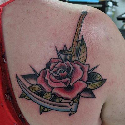 A gorgeous traditional rose and scythe was done by Tony Soto.