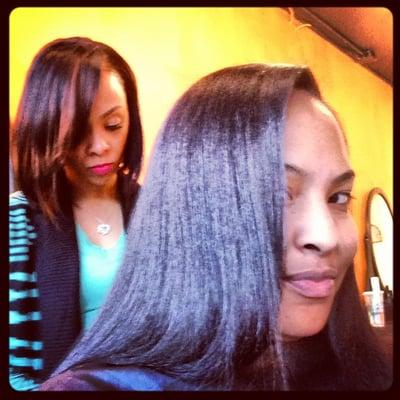 Wash, Condition and Flat Iron by Lashawn.