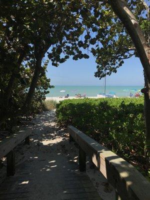 A 3 block walk through a quiet neighborhood to 5th Avenue. On the Gulf side of Tamiami Trail...10 minute stroll to the beach.