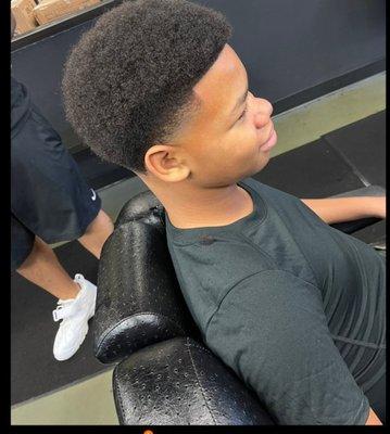 SHAPE UP OF AFRO AND LINE UP WITH TAPERS.