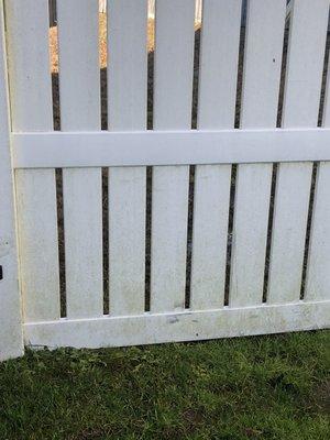 Dirty fence pressure washed