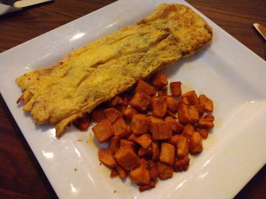 Veggie omelette with some home fries