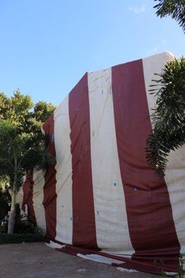 Tarp on home to treat for dry-wood termites.