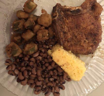 Fried pork chop, fried okra, black eyed peas and cornbread