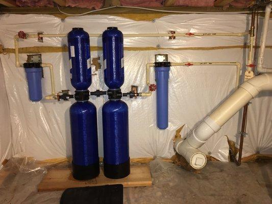 A beautifully installed whole house water filtration system - like a work of art!