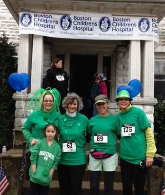 Staff participating in Medford's Running of the Leprechauns fundraiser for Boston Children's Hospital