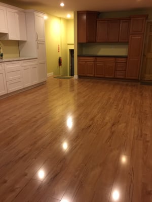 kitchen counter-top, cabinets, and laminate flooring.