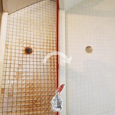 The rust stains on this tile shower were safely removed after our professional tile and grout restoration services