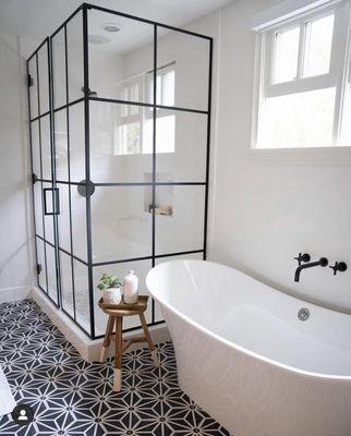 Custom matte black metal frame and grid pattern shower enclosure