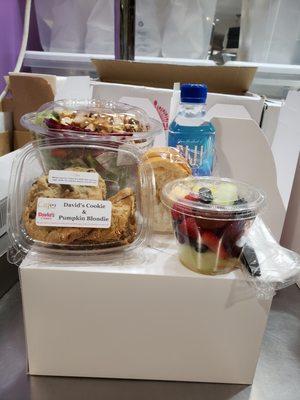 Gourmet Boxed lunch: Entrée salad, mini baguette and butter, fresh fruit cup, cookie and brownies, Artisan water and cutlery set.