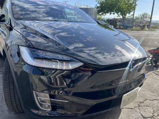 Another Tesla done. Front bumper and Hood Chips and Dents repair