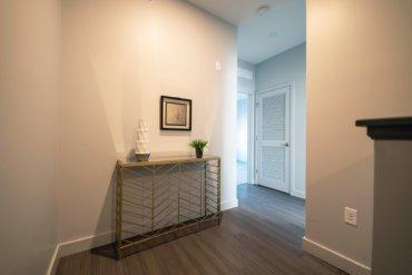 Spacious and well-lit hallway on the second floor of our 2-bedroom townhome.