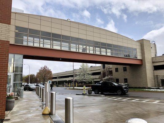 The covered walkway connecting the parking ramp to the hospital