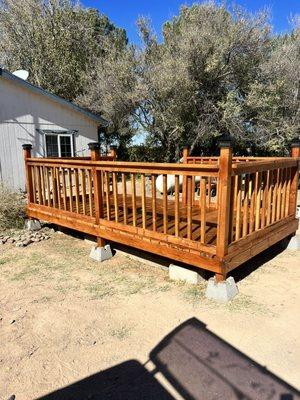 8x14 deck with railing to cover in ground water tank.