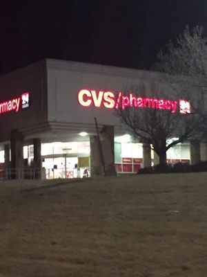 Outside of Cvs at night.