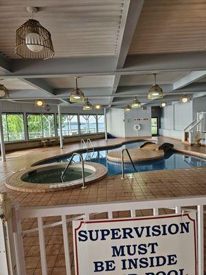 Indoor pool and jacuzzi  (the green water is a turn off) some lighting didn't work on celling ,annoying alarm going off constantly