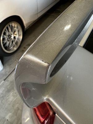 Chipped paint on edge of spoiler