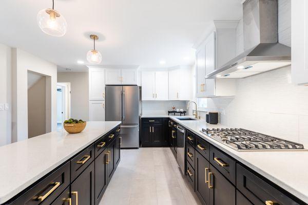 White and black shaker kitchen with crown molding