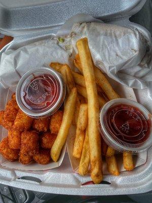 Regular order of Tater Tots($4.79) and Regular size of French Fries ($4.29). In the white wrap is The High Steak