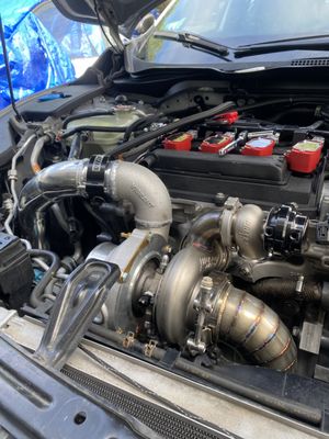 This is a fully custom project we designed for a happy customer to get 650 horsepower out of their 2018 Civic