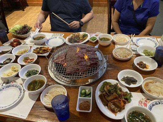 Grilled beef ribs. And bunch of side dishes.