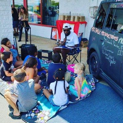 MCP Interactive Story Time taking place at the Staples Back to School Party. 2019