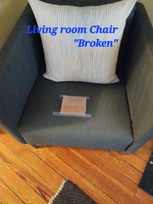 Cardboard sign telling us the chair is" broken". Wouldn't it have been easier to remove the chair from the property?