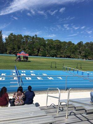 King's academy track. They are hosting track meet but are charging every spectator money to watch.