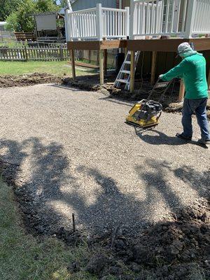 Custom deck with a 3 piece paver patio.