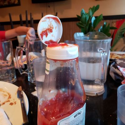 Nasty ketchup bottle. I cleaned the ouside with an antibac wipe.