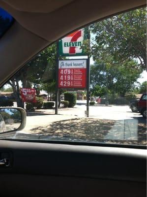 The 7-Eleven directly across the street only charged $4.09 for regular gas for cash, credit, or debit on 6/18/2014.