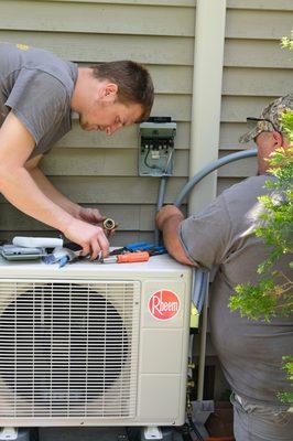 Leon C. Landis working on a Ductless Mini Split