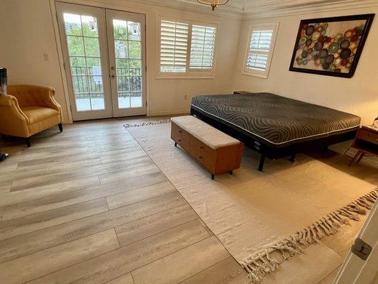 Bedroom floor after install and new French doors