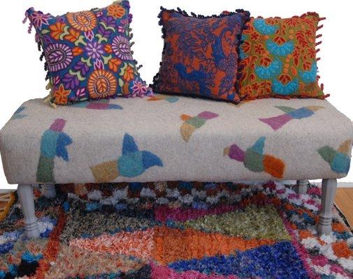 Cultural Cloth features home decor from around the world.  Pictured here we have:  Peru, Kyrgyzstan and Morocco