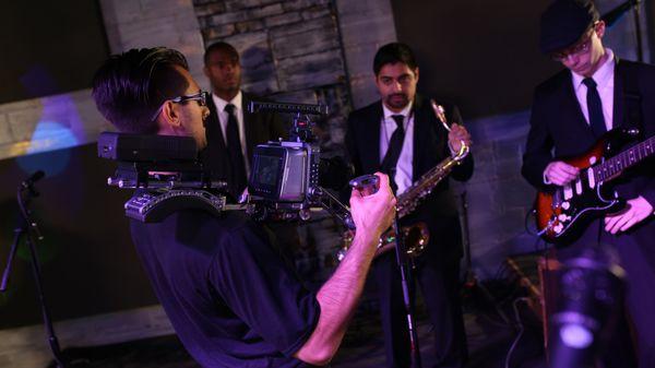 Behind the scenes of a music video for the Groove Cartel.