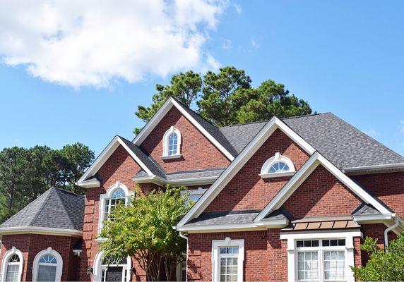 We replaced the roof on this beautiful home with CertainTeed Landmark Pro. The homeowner chose the color of moire black!