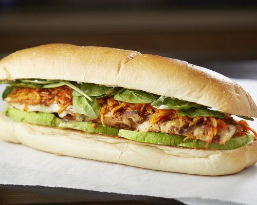 Sweet Praveena: Grilled spiced chicken and avocado with caramelized carrots, spinach and melted pepper jack cheese on a toasted hero.