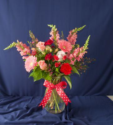 Vased arrangement in pinks