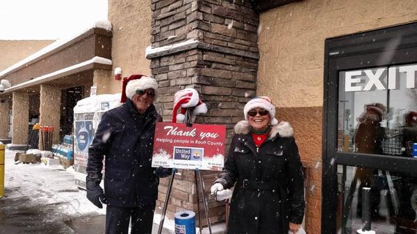 Karen and Mix Beauvais ringing the bell for United Way! Coldwell Banker Distinctive Properties- Distinctive Angels