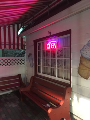 Seating area - outdoors, under an awning.  Very pleasant on a summer evening.