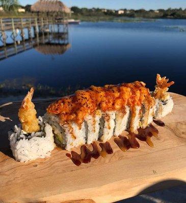 Dragon Roll: Shrimp tempura, cream cheese, avocado, topped with lobster & cheddar